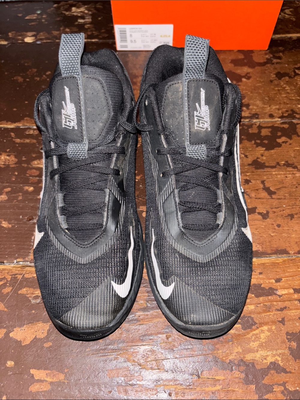 Nike Men’s Black Athletic Shoes with White Swoosh